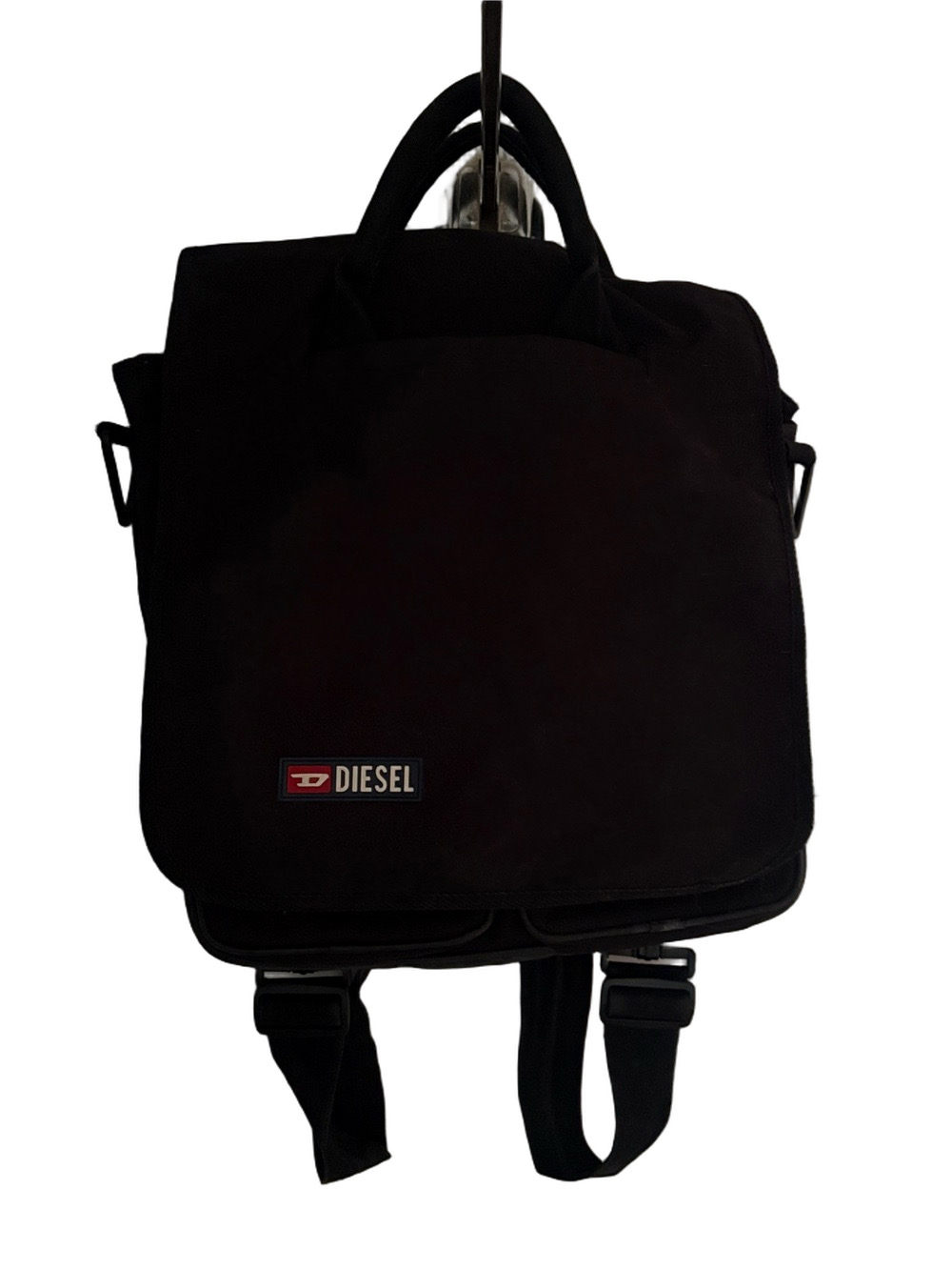 Diesel Vintage Black Canvas Backpack with Red Logo Accent.